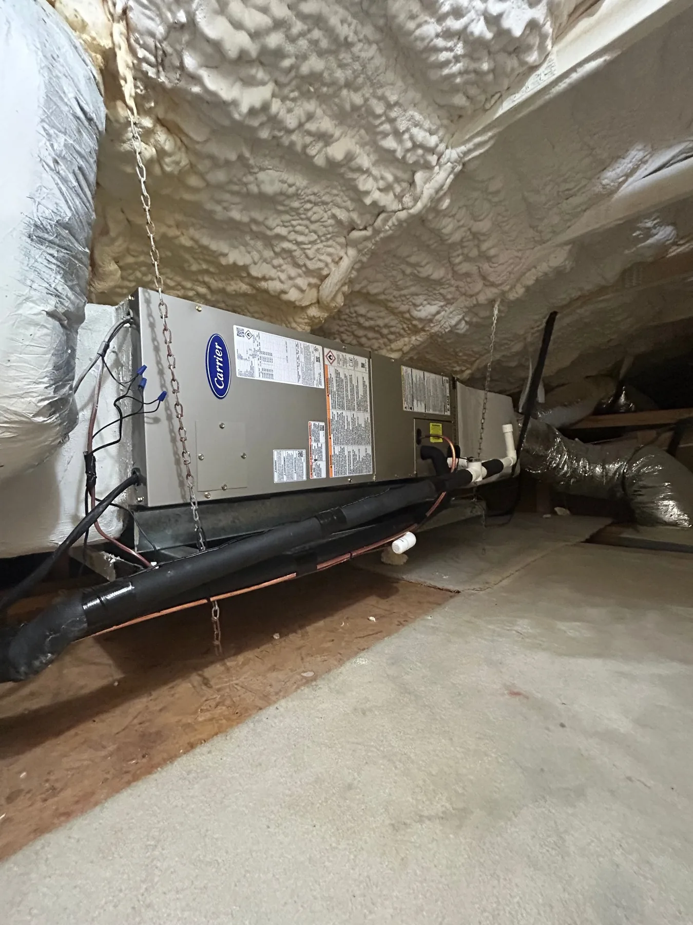 Carrier air handler and condensate drain system in a Central Florida attic