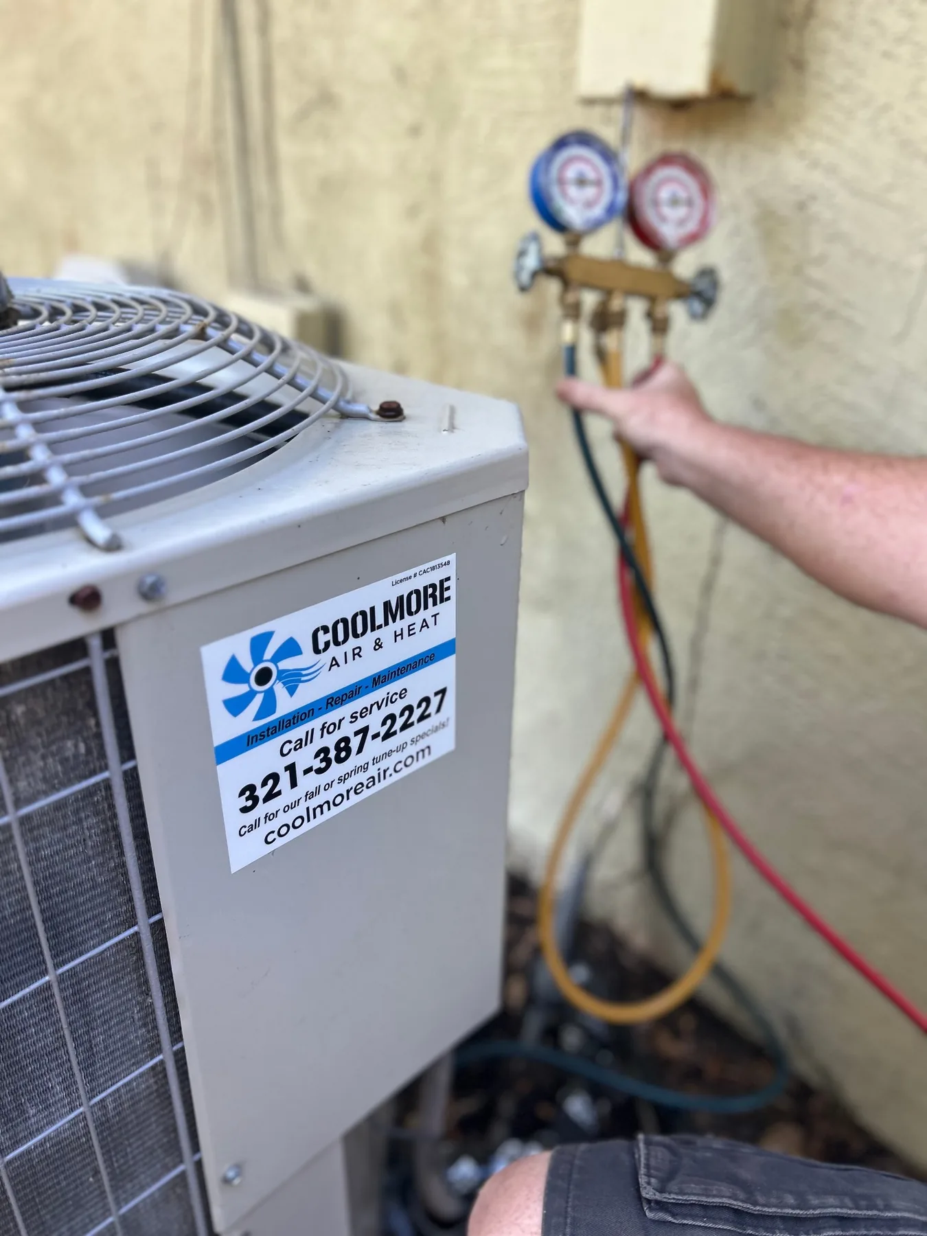 Coolmore technician checking HVAC system operation